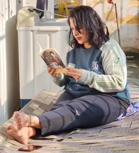 sweety rathi enjoying reading books.